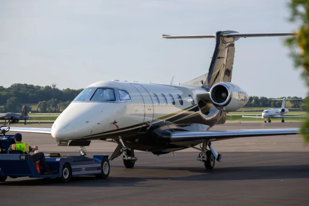 Private business jet being serviced on a sunny tarmac, the traffic Cannes-Mandelieu handles